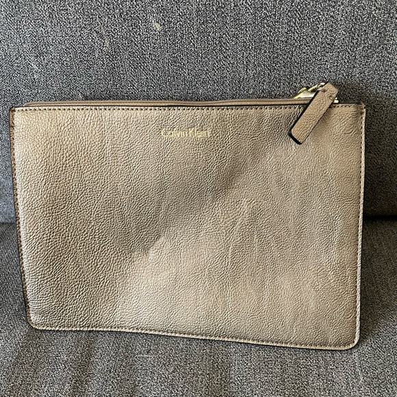 Calvin Klein Handbags - Calvin Klein Beige Leather Pouch
